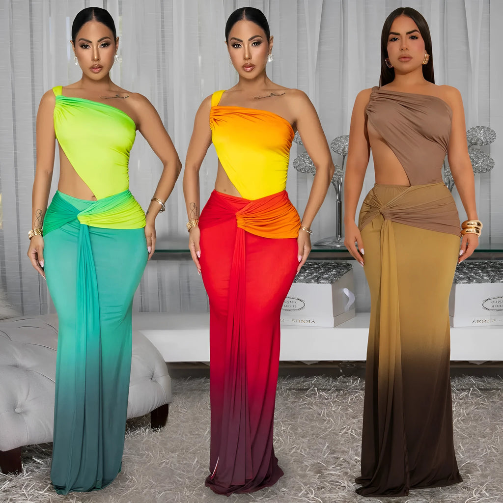 Women's gradient colour asymmetric cross-shoulder sleeveless dress with a high waist and long skirt.