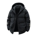 A man wearing a black hooded cotton-padded winter coat with letter-print detail and side pockets.