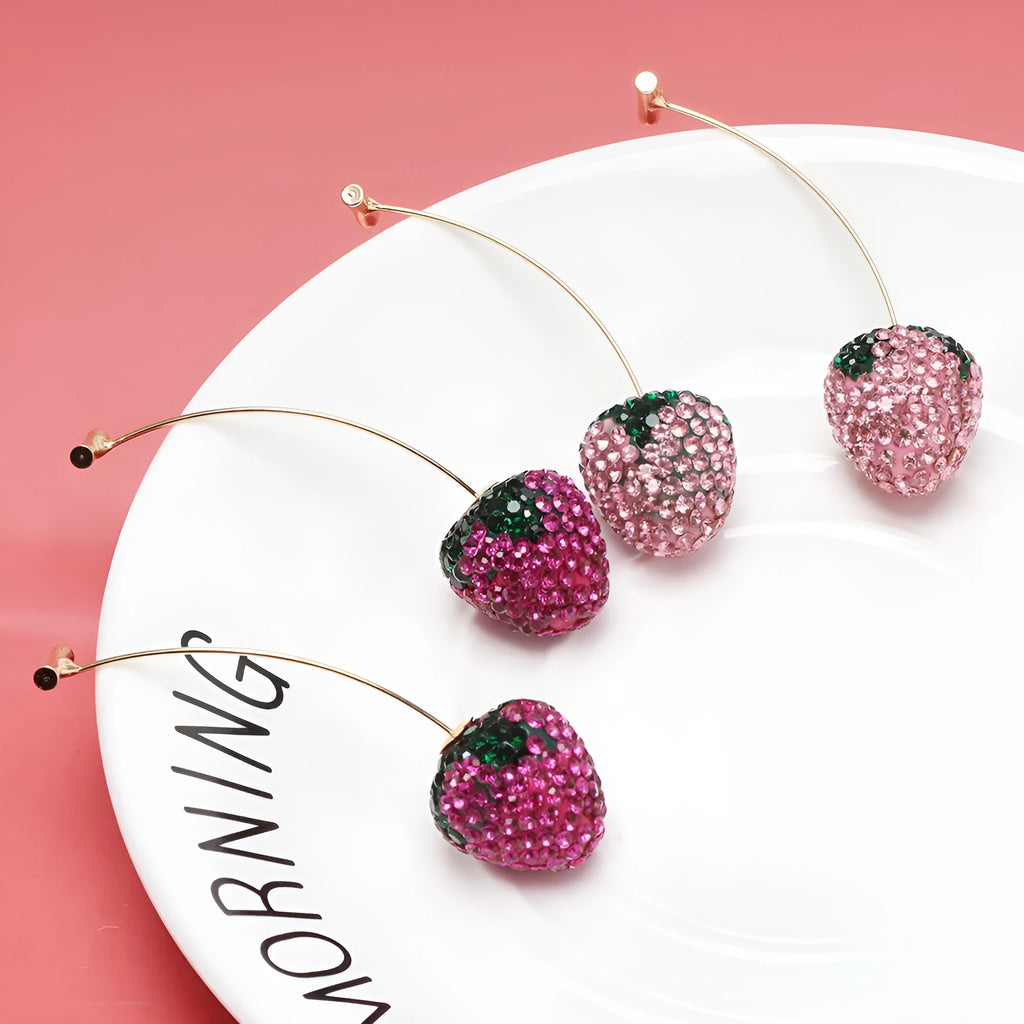 Red geometric strawberry-shaped dangle earrings with spot drill texture on zinc alloy.