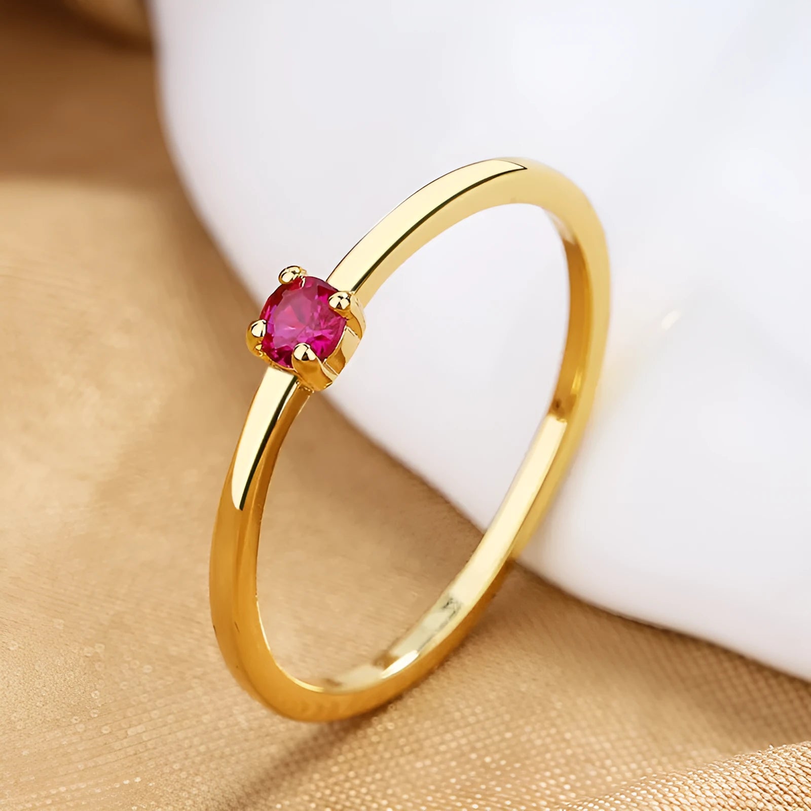 Copper geometric fine circle ring for women with a single diamond, shown in blue colour.