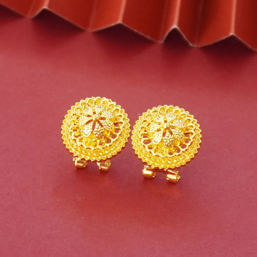 Gold-plated three-piece jewellery set showing necklace with pendant, earrings, and ring with middle eastern flower design