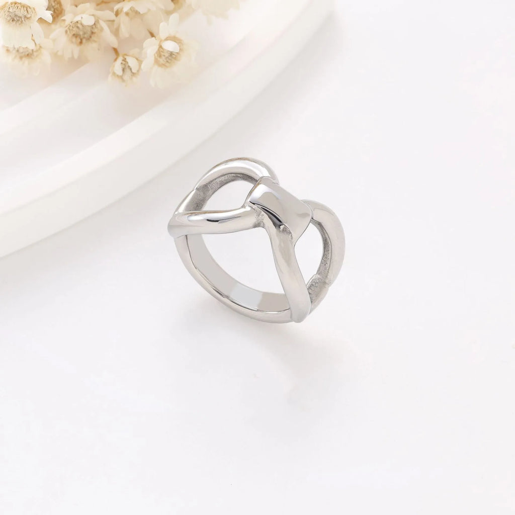 Women's butterfly bow hollow ring in titanium steel with geometric cut-outs, gold and steel colour options