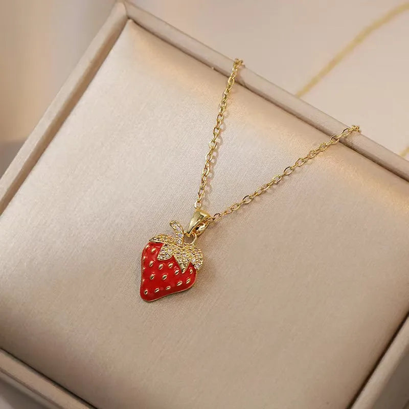 Delicate indie cherry strawberry pepper necklace on a titanium steel O-ring chain