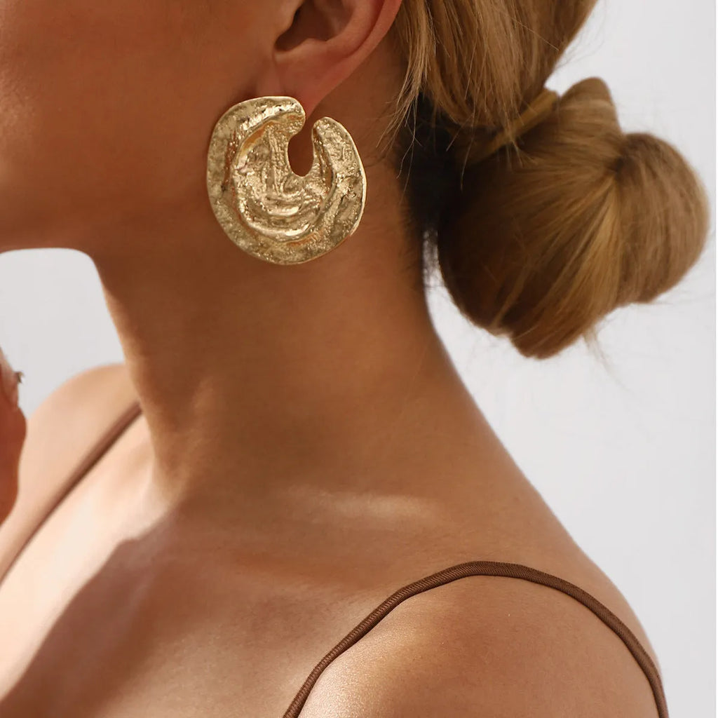 Exaggerated geometric women's earrings with irregular pleating and concave-convex texture in gold colour