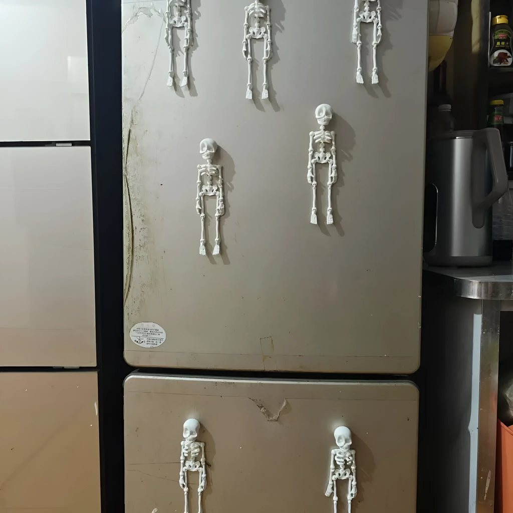3D printed white skull refrigerator magnet Halloween ornament measuring 18cm tall.