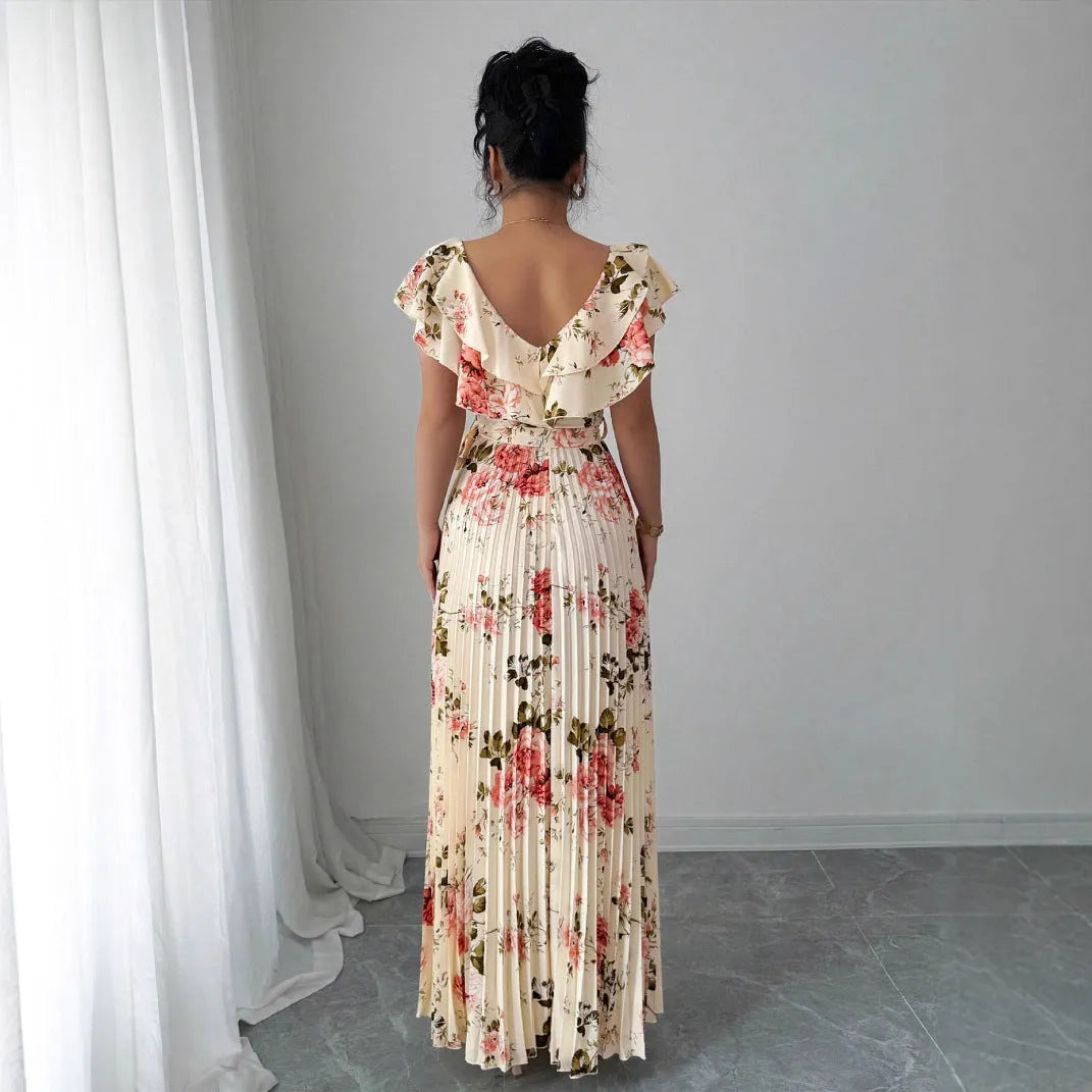 Apricot floral print women's dress with V-neck, ruffled sleeves, and a high-waisted swing skirt.