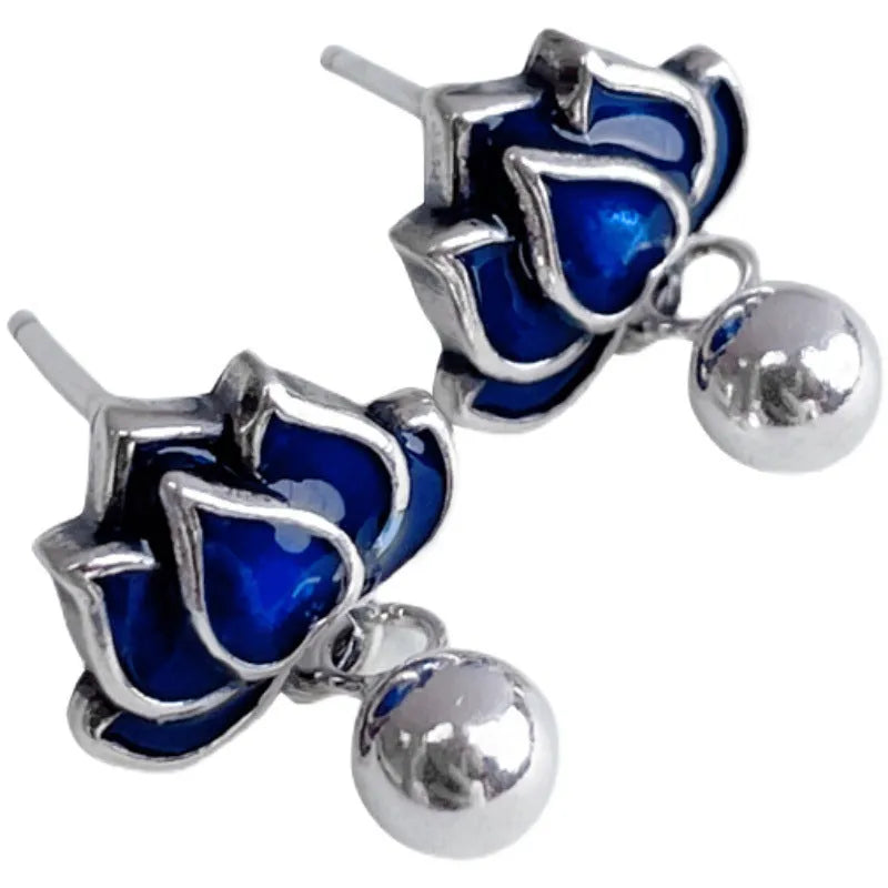 Silver Needle alloy lotus seedpod ear studs with tassel detail, 1.2cm wide.