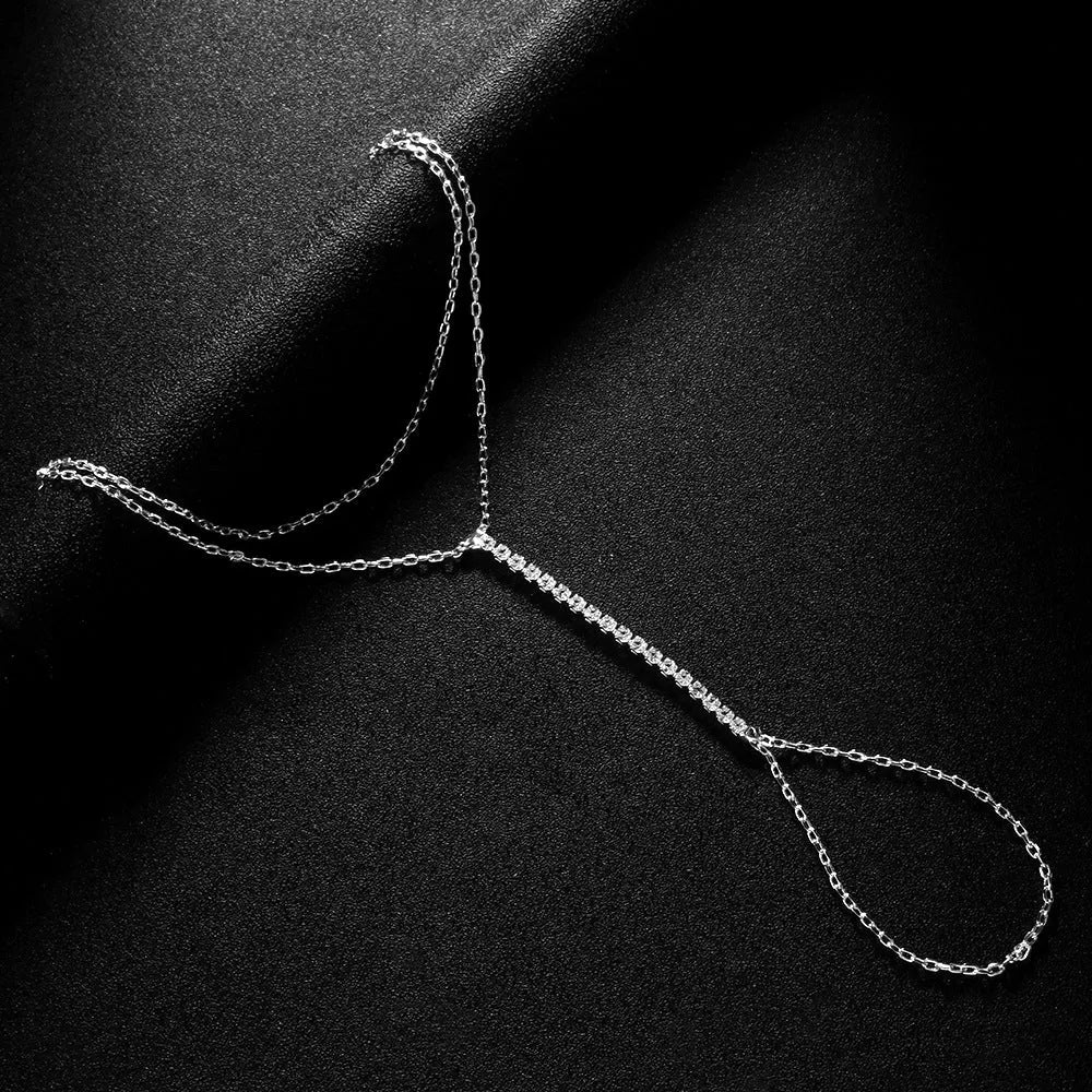 Women's geometric bohemian alloy bracelet with rhinestones in silver colour on a white background.