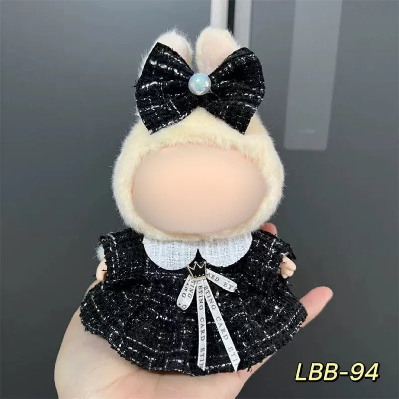 Plastic doll clothes costume for a 17cm tall vinyl figurine on a white background.