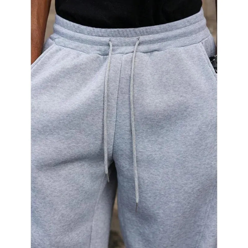 Men's straight-leg trousers in black colour with high waist and cropped length design