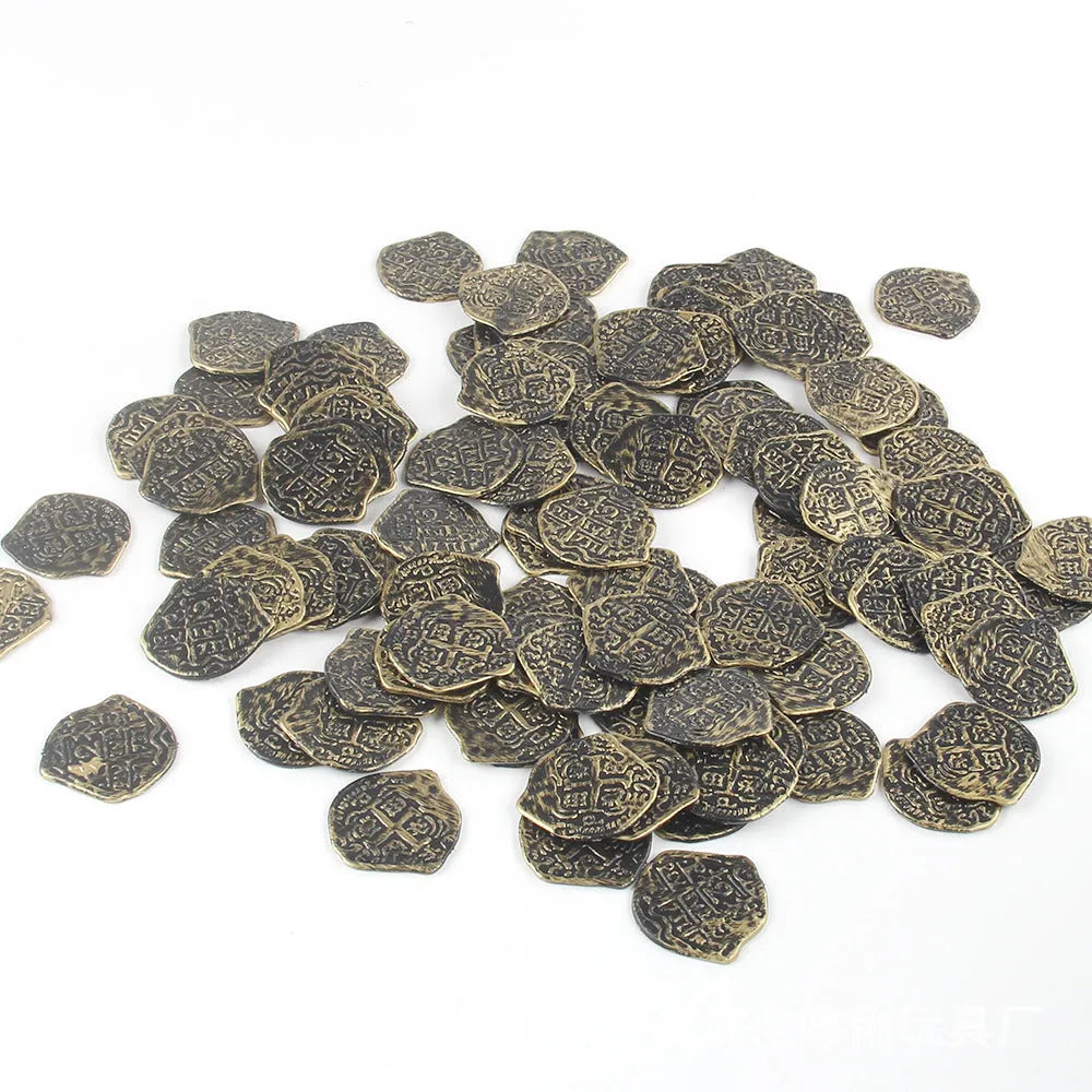 Set of 100 electroplated plastic Roman coins in a pile, showing gold, silver, and bronze metallic finishes.