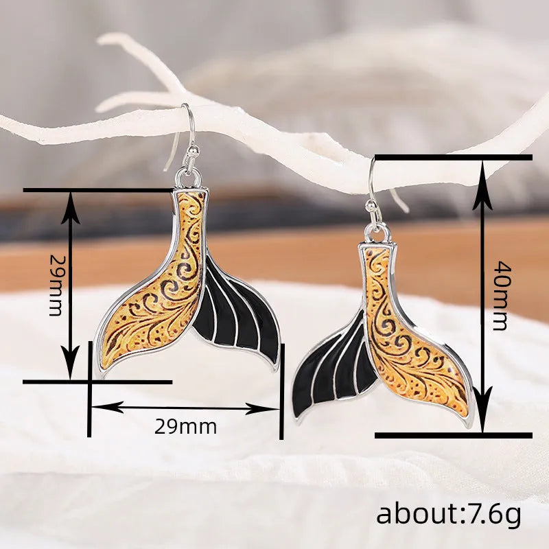 Women's retro fish tail earrings with whale design in white gold colour alloy