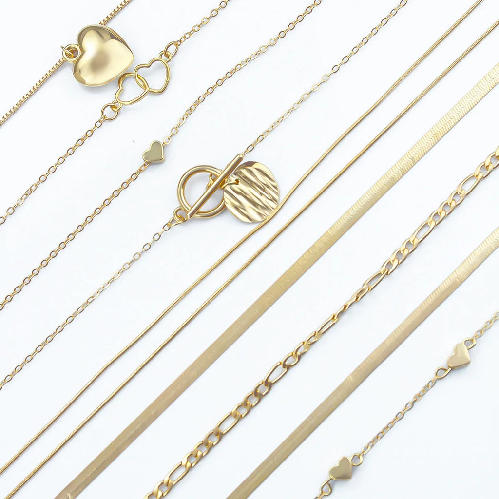10-piece gold electroplated women's necklace set with simple alloy pendants on snake bone chains