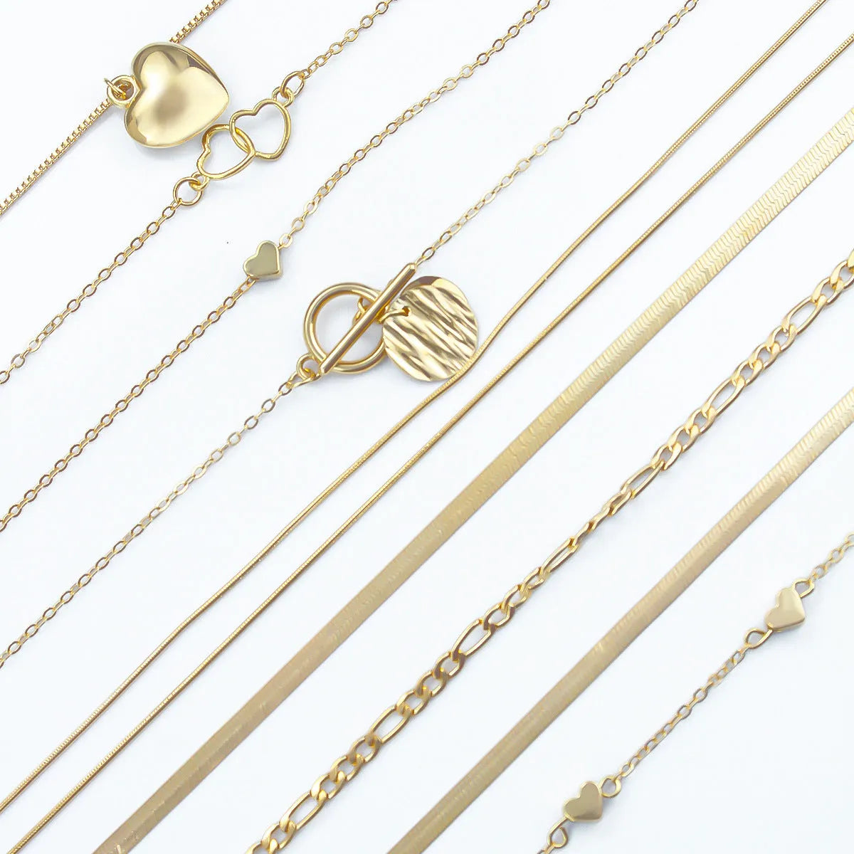 10-piece gold electroplated women's necklace set with simple alloy pendants on snake bone chains