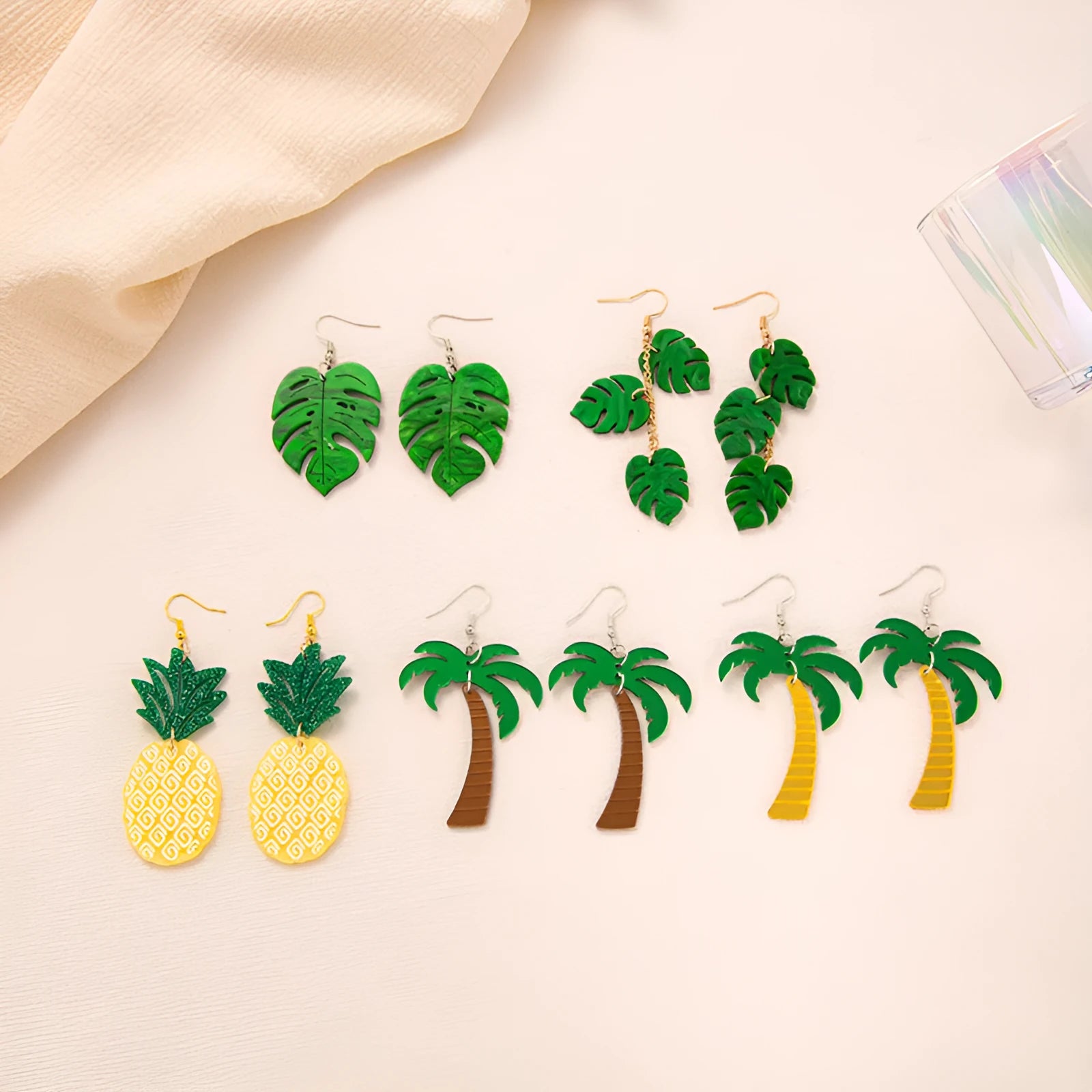 Drop-shaped acrylic earrings in a coconut jackfruit design with an alloy hook, shown in multiple colour variants.