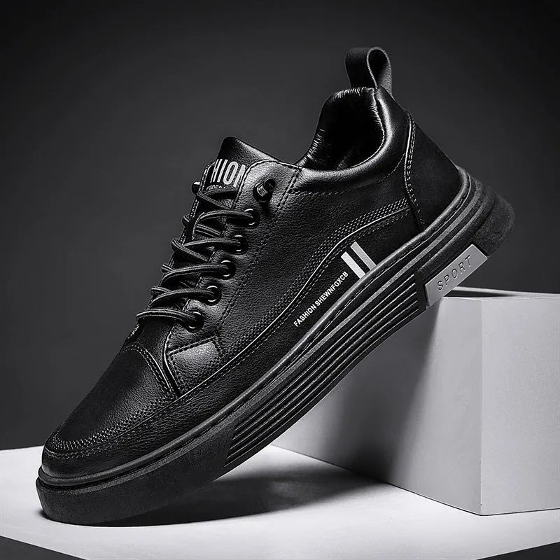 Men's white and black low-top skate shoes with elastic band and round toe.
