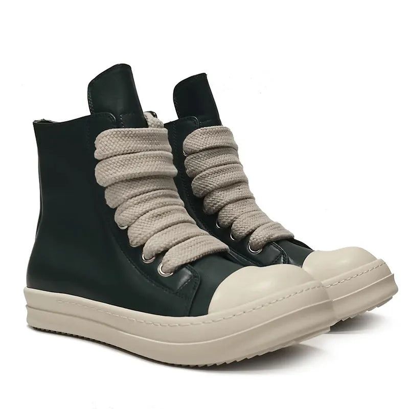 Black high-top leather sneakers with a side zipper and visible stitching on a white background.