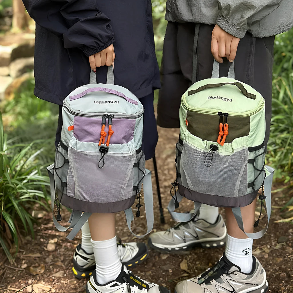 Japanese style casual backpack in lightweight nylon, showing curved shoulder straps and solid colour options.