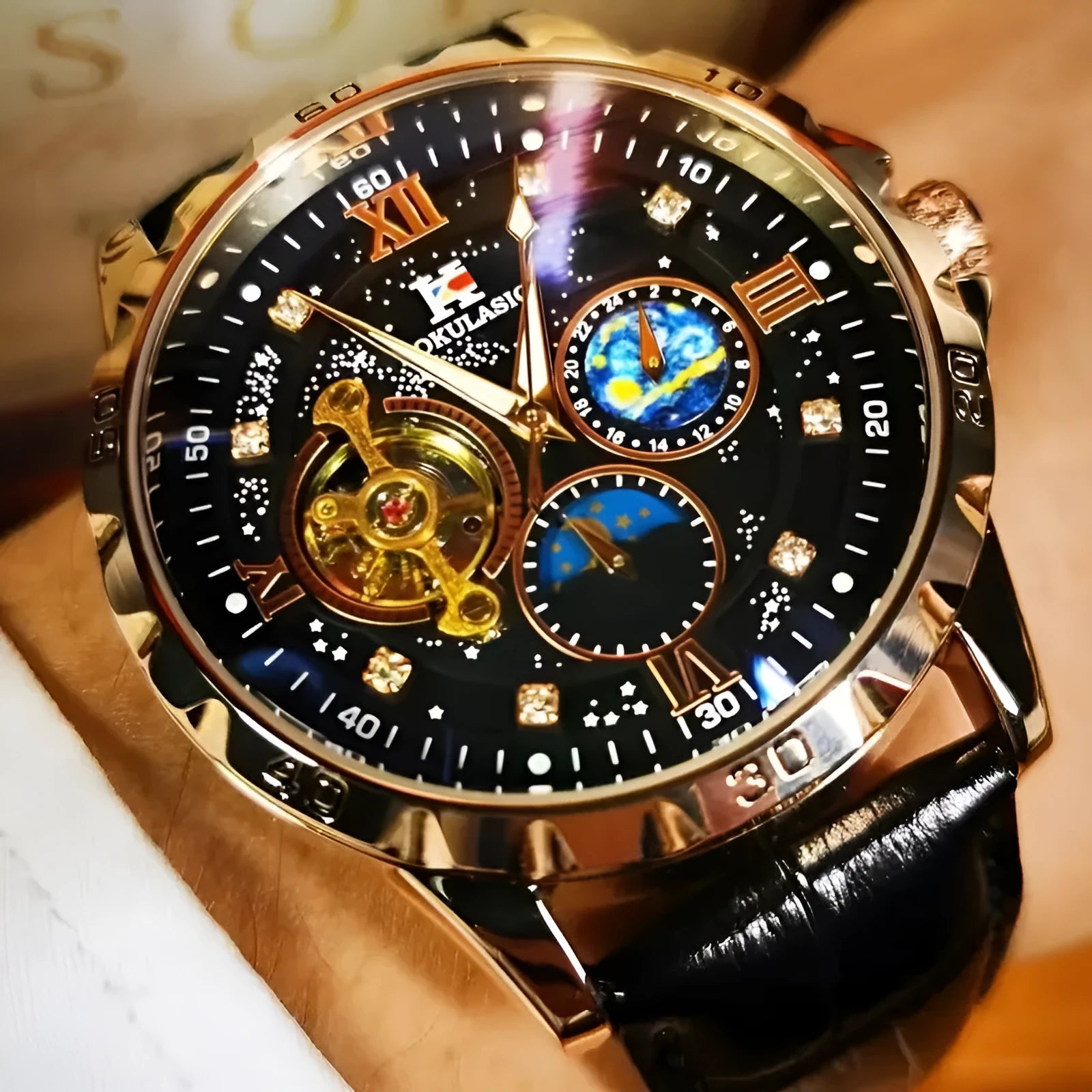 Automatic mechanical watch with hollow dial, rose gold case, black leather strap