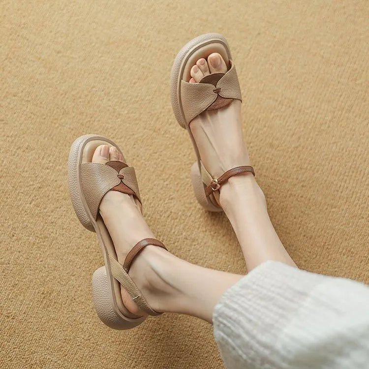 Women's khaki platform sandals with a chunky heel and open toe design on a rubber sole.