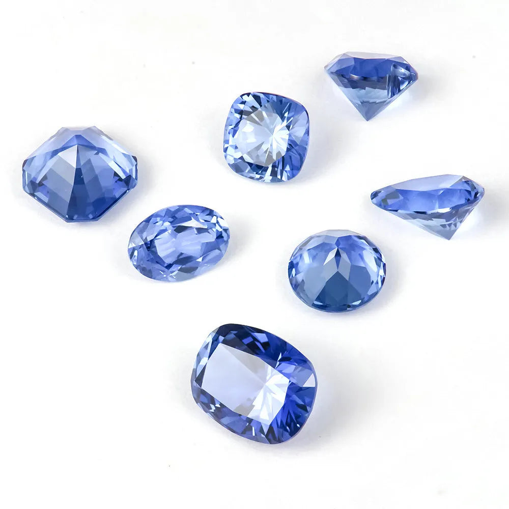 Royal blue gemstone in heart shape with modern cut on neutral background