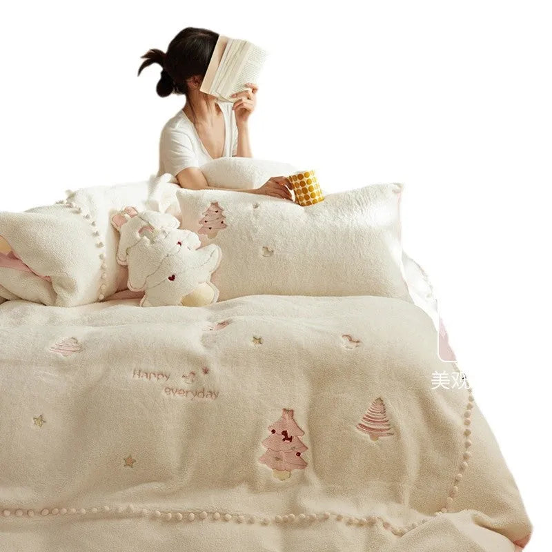 Milk fibre bedding set with green Christmas tree pattern showing quilt cover, fitted sheet, and pillowcases arranged on bed