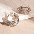 Geometric hollow stud earrings with twisted round design in electroplated copper