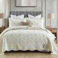Pure cotton embroidered bed cover set with pillowcases on a double bed.