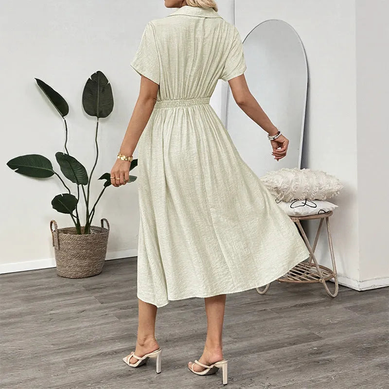 Light green shirt dress with lapel collar, waist tie, and side pockets