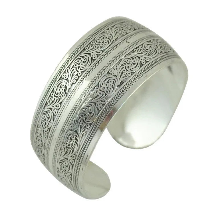 Open carved Miao ethnic bracelet with Roman shape in alloy material showing turtle design