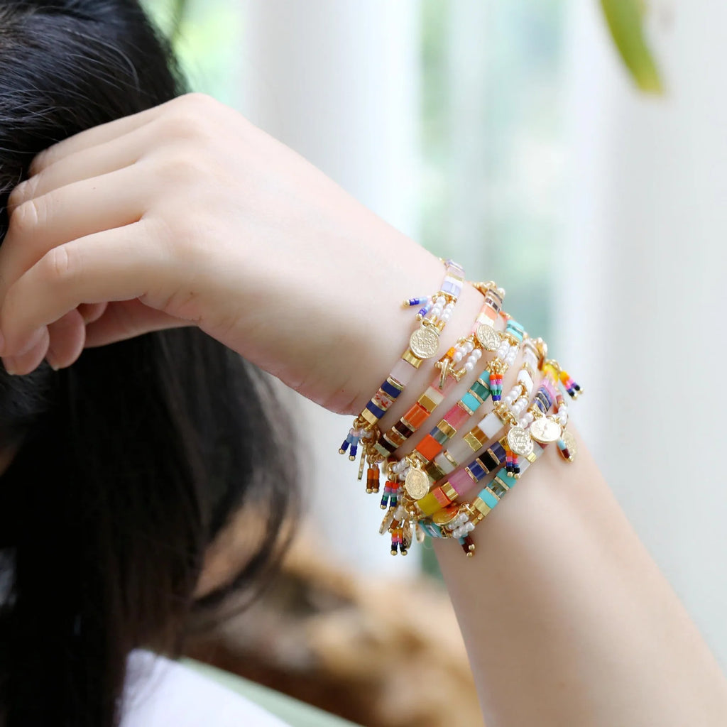 Women's handmade imitation pearl beaded bracelet with adjustable clasp in a choice of six colours.