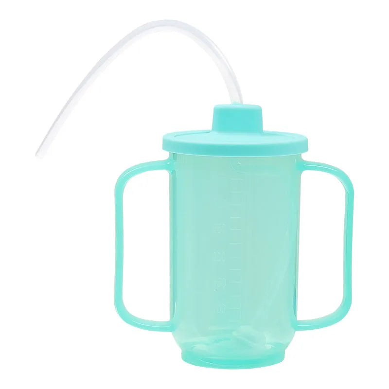 White PP plastic oblique mouth drinking cup with handle and lid for adult bedside use.
