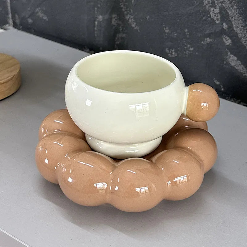 High temperature resistant ceramic coffee mug and saucer set in a simple Nordic style, 250ml capacity.
