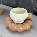 High temperature resistant ceramic coffee mug and saucer set in a simple Nordic style, 250ml capacity.