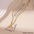 Women's strawberry-shaped alloy pendant necklace on a stainless steel chain in red or white powder gradient colour.