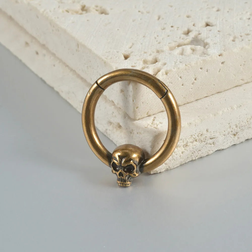 Vintage copper punk earrings with Gothic ghost head designs in antique silver or gold finishes