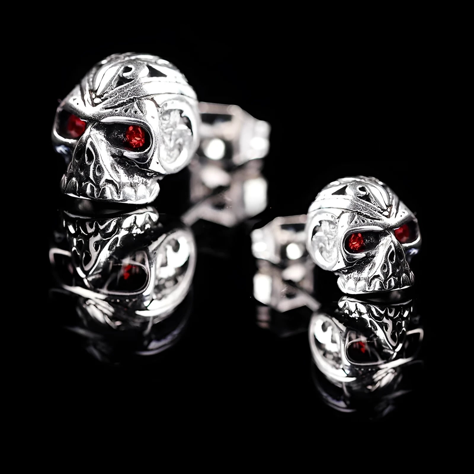 Retro skull stud earrings with red eye ghost head design and gemstone inlays on alloy base