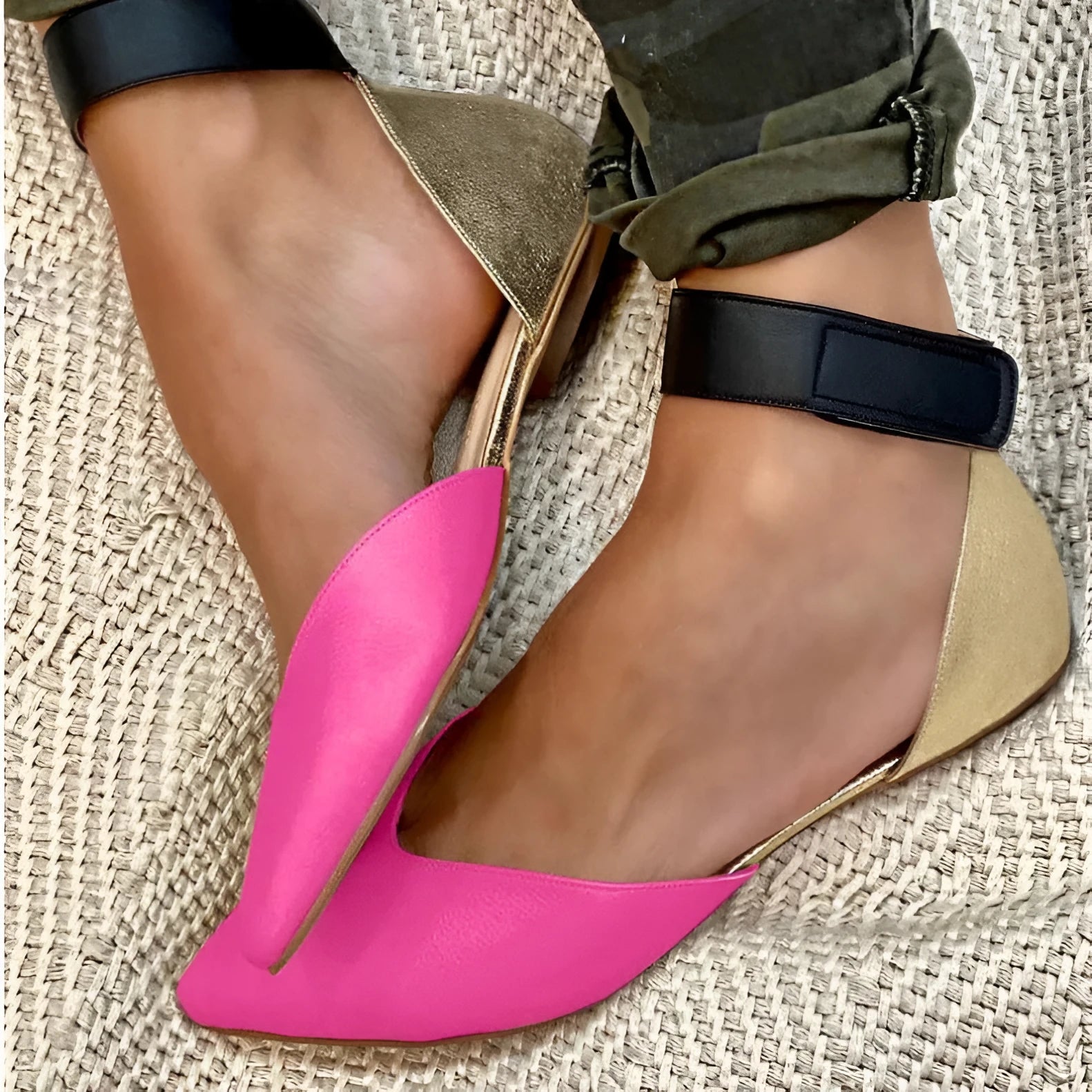 Women's beige velcro sandals with a hollowed flat heel design on a white background.