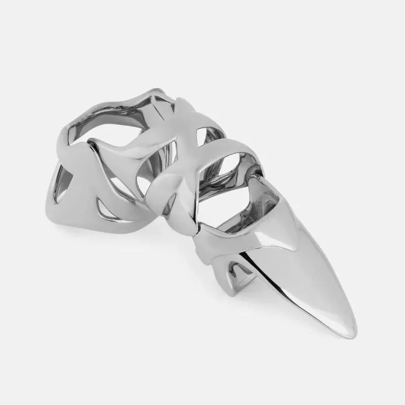 Silver alloy punk armour finger stall fashion ring on a finger.
