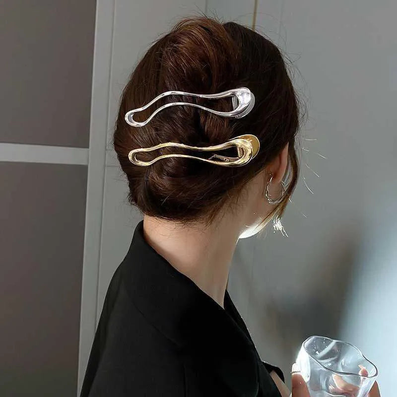 Women's fashion barrettes in zinc alloy with gold and silver finishes showing arc, square, and triangle shapes