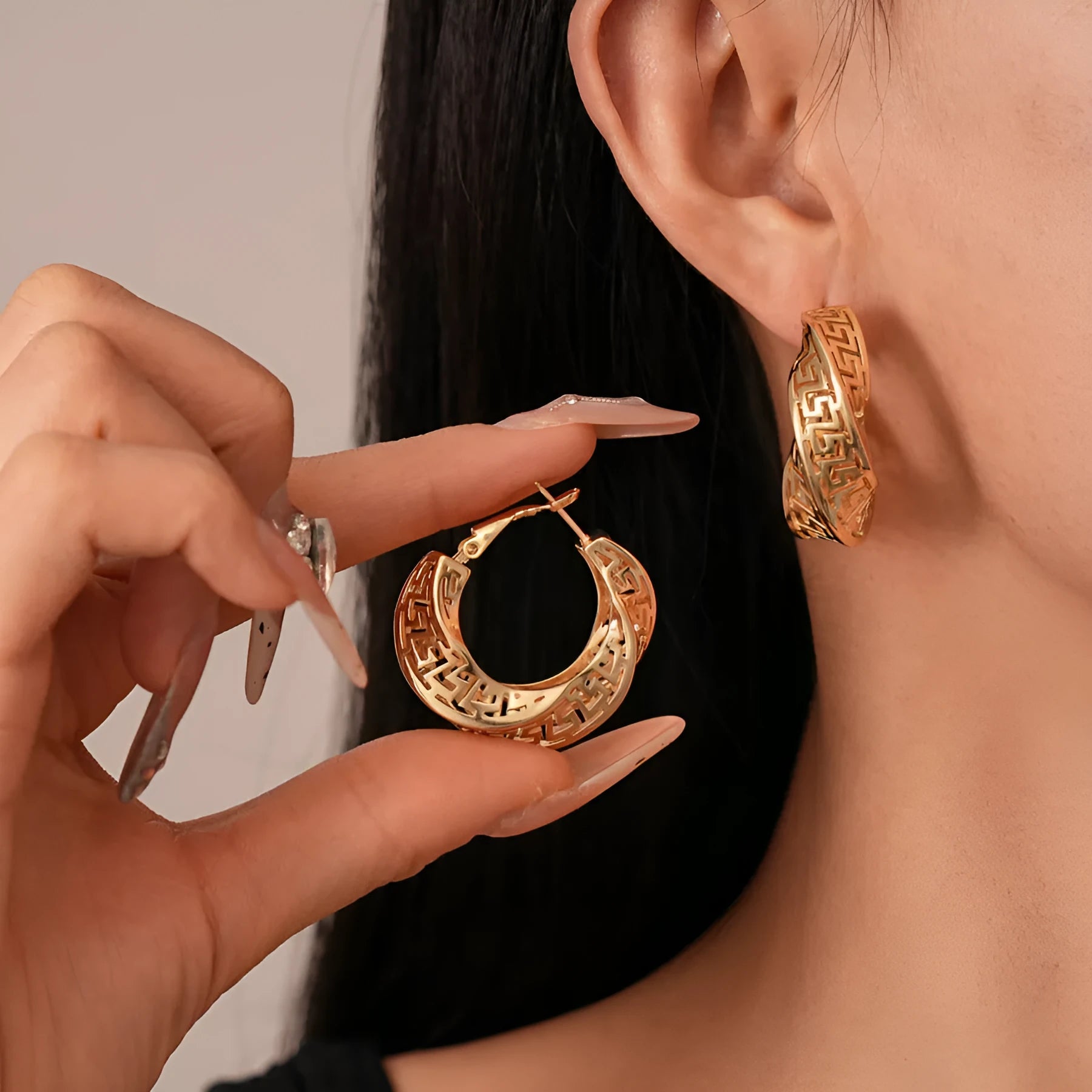 Geometric hollow stud earrings with twisted round design in electroplated copper