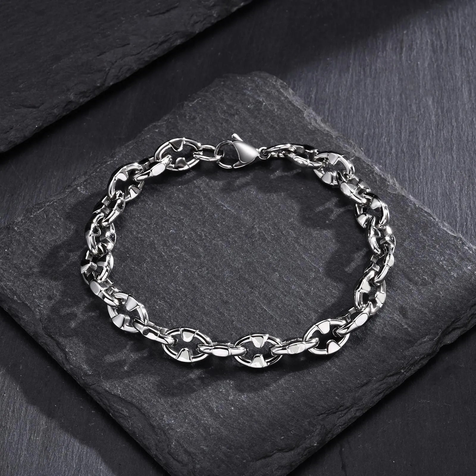 Men's thick handmade stainless steel chain bracelet with geometric links in steel colour.