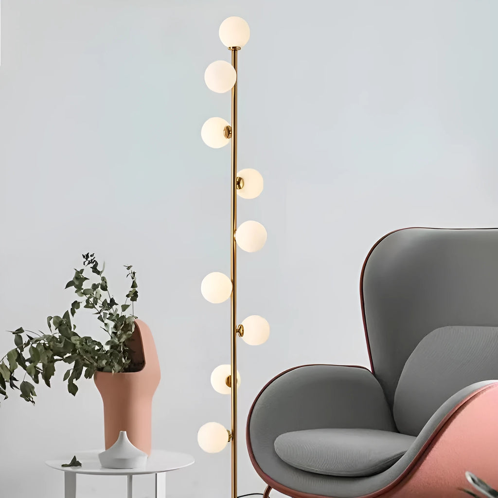 Tall minimalist Nordic style floor lamp with iron frame and glass shade on a stable iron base.