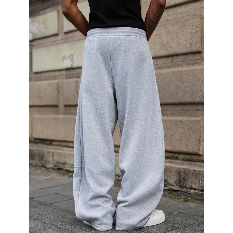 Men's straight-leg trousers in black colour with high waist and cropped length design