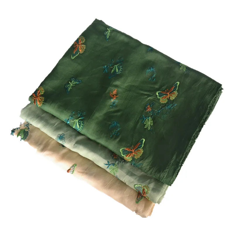 Pure ramie Hanfu fabric showing texture detail with beige, dark green, and grass green colour options