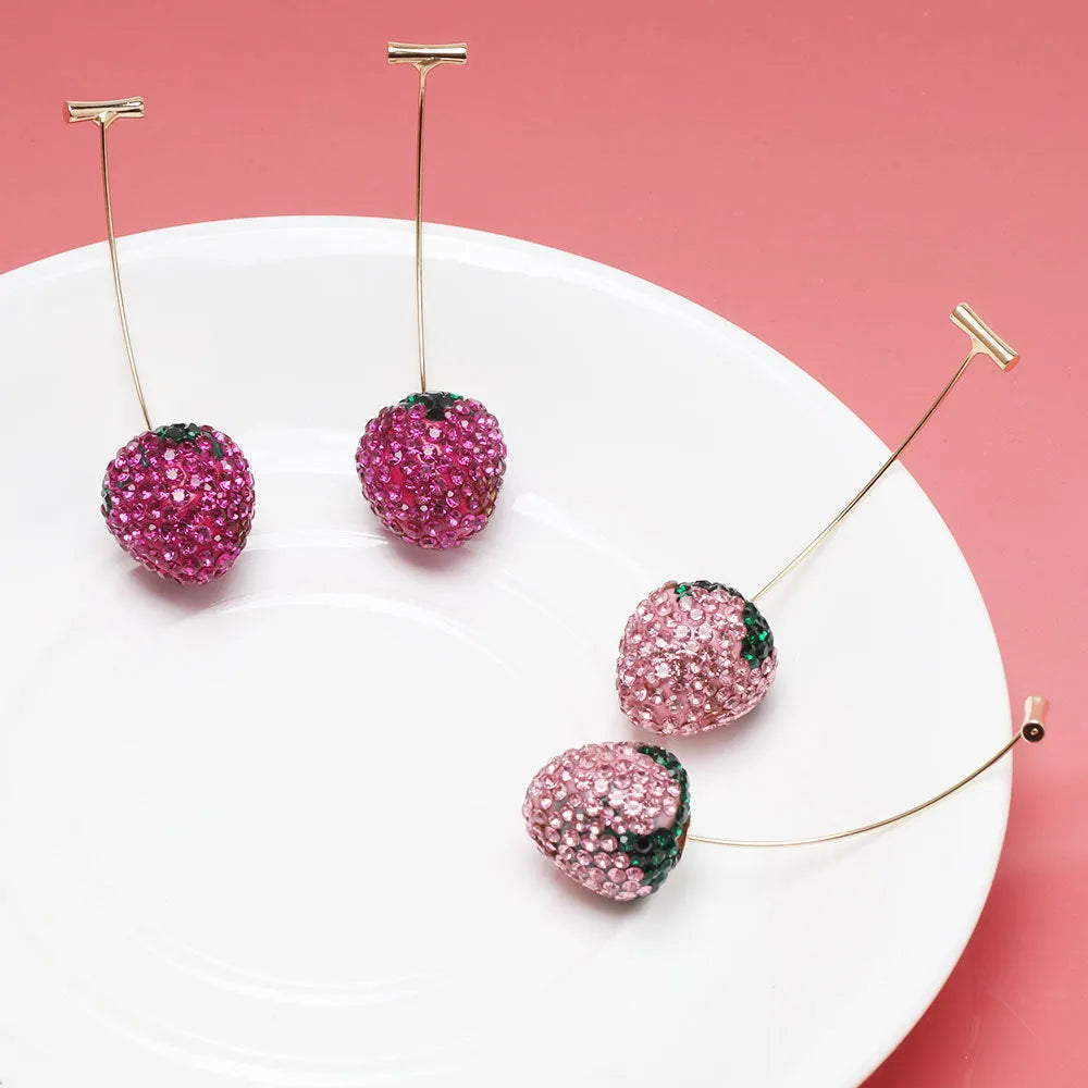 Red geometric strawberry-shaped dangle earrings with spot drill texture on zinc alloy.