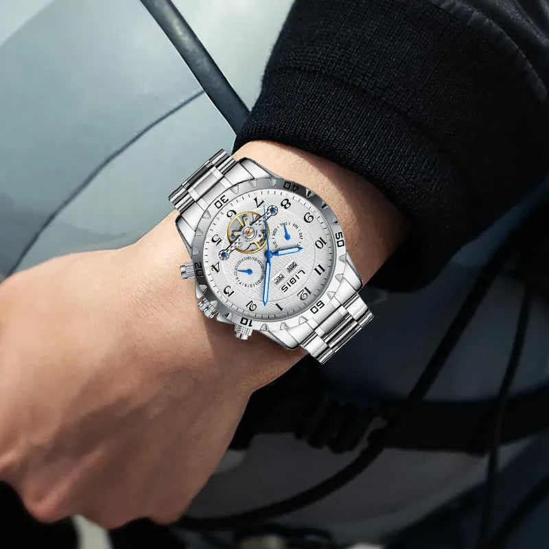 Men's silver stainless steel automatic perpetual calendar mechanical watch with a business-style dial.