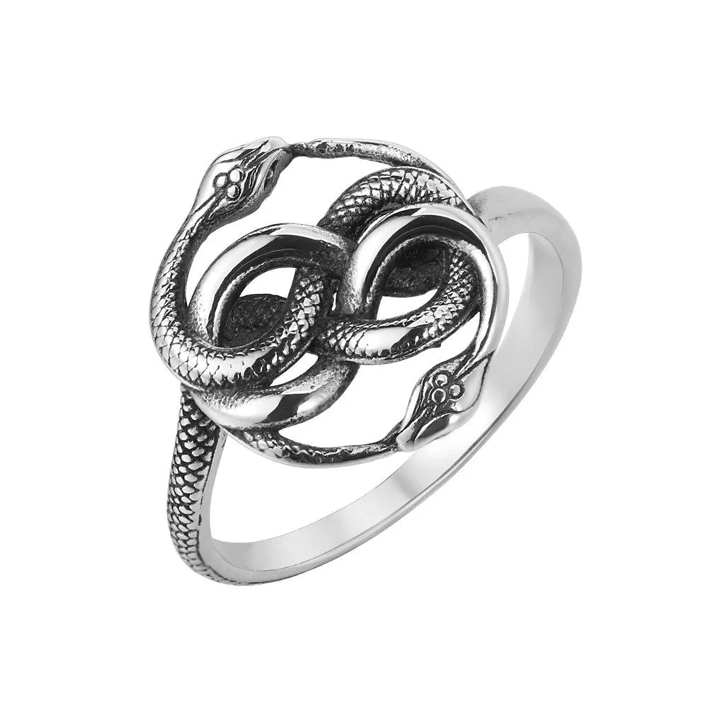 Titanium steel double snake ring in steel colour on a plain background, showing retro design detail.