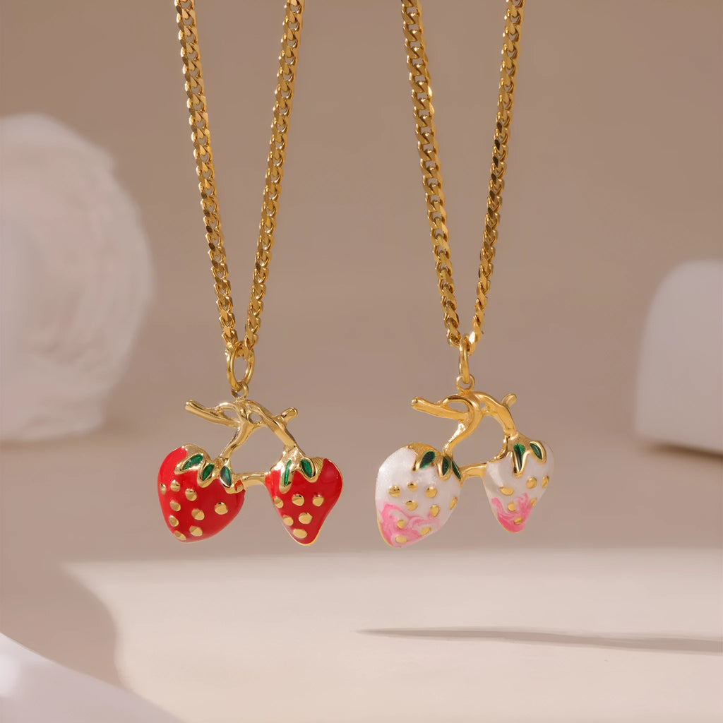 Women's strawberry-shaped alloy pendant necklace on a stainless steel chain in red or white powder gradient colour.