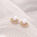 Retro fan-shaped silver colour alloy earrings with rhinestone and opal decorative details.